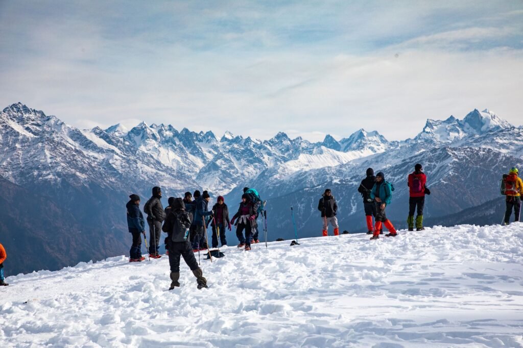 Brahmatal Trek in winter with snow-covered trails and panoramic Himalayan mountain views